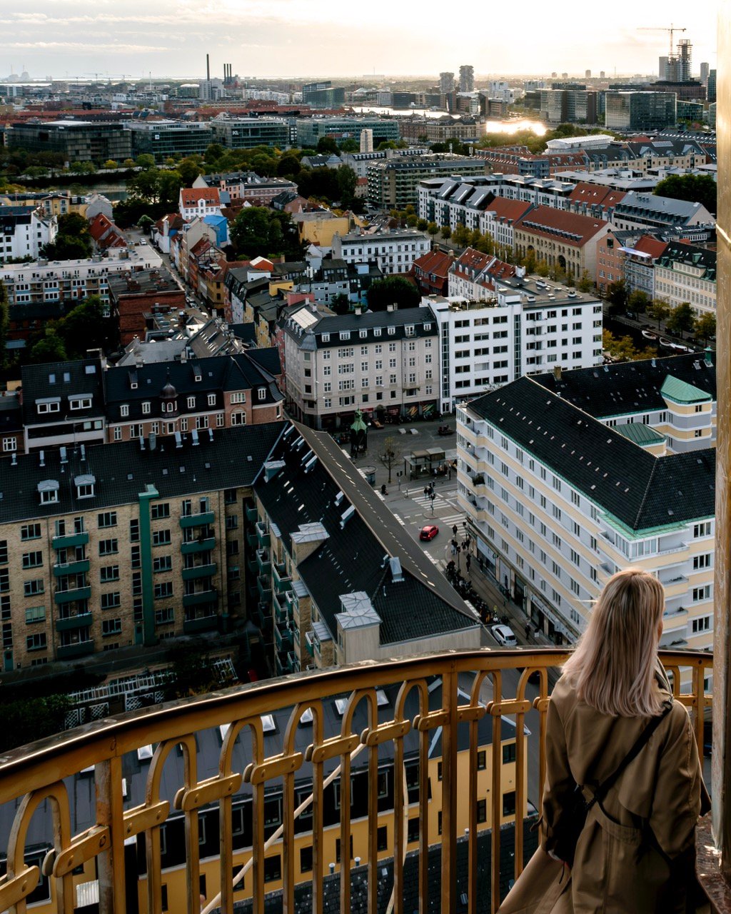 Photo of a woman on the observation deck at Vor Frelsers Kirke in Copenhagen