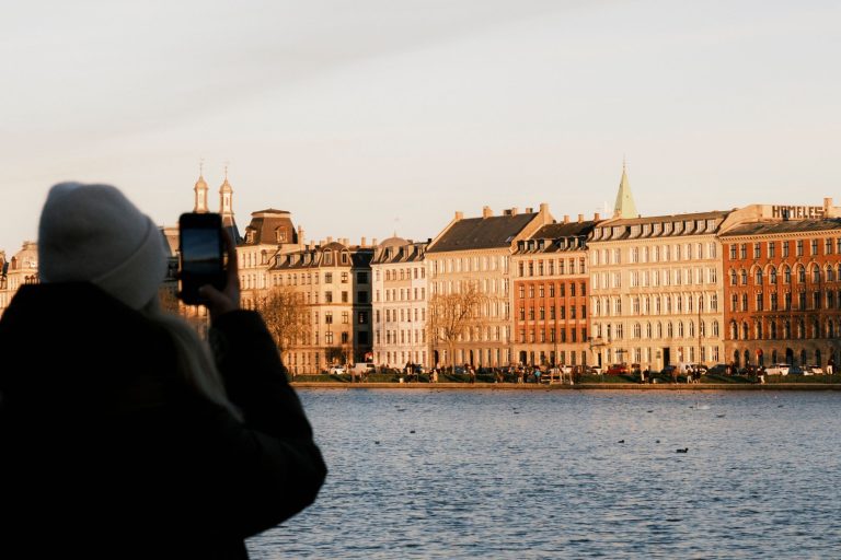 A person taking photos at The Lakes, Copenhagen