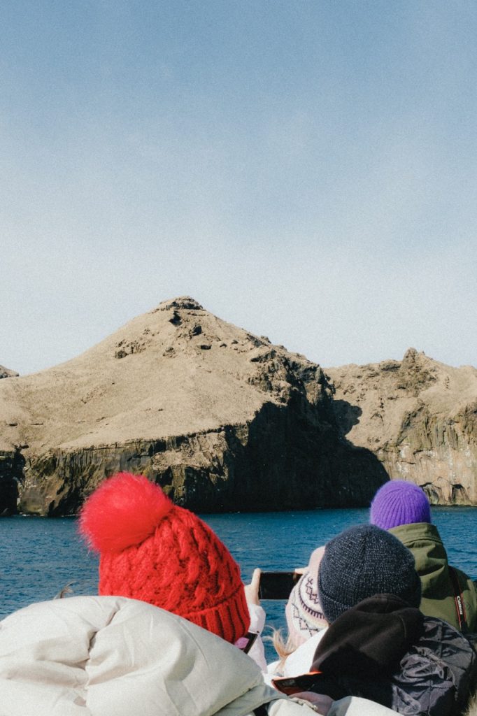Photo of people on a boat in the Westman Islands