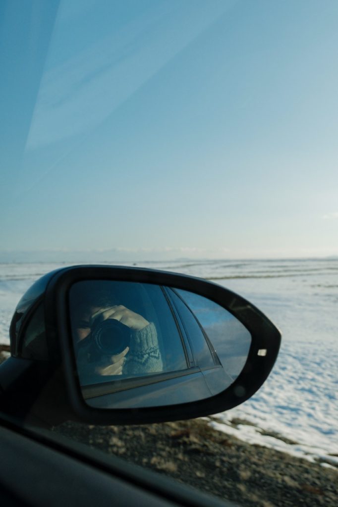 Taking photos on a road trip in Iceland