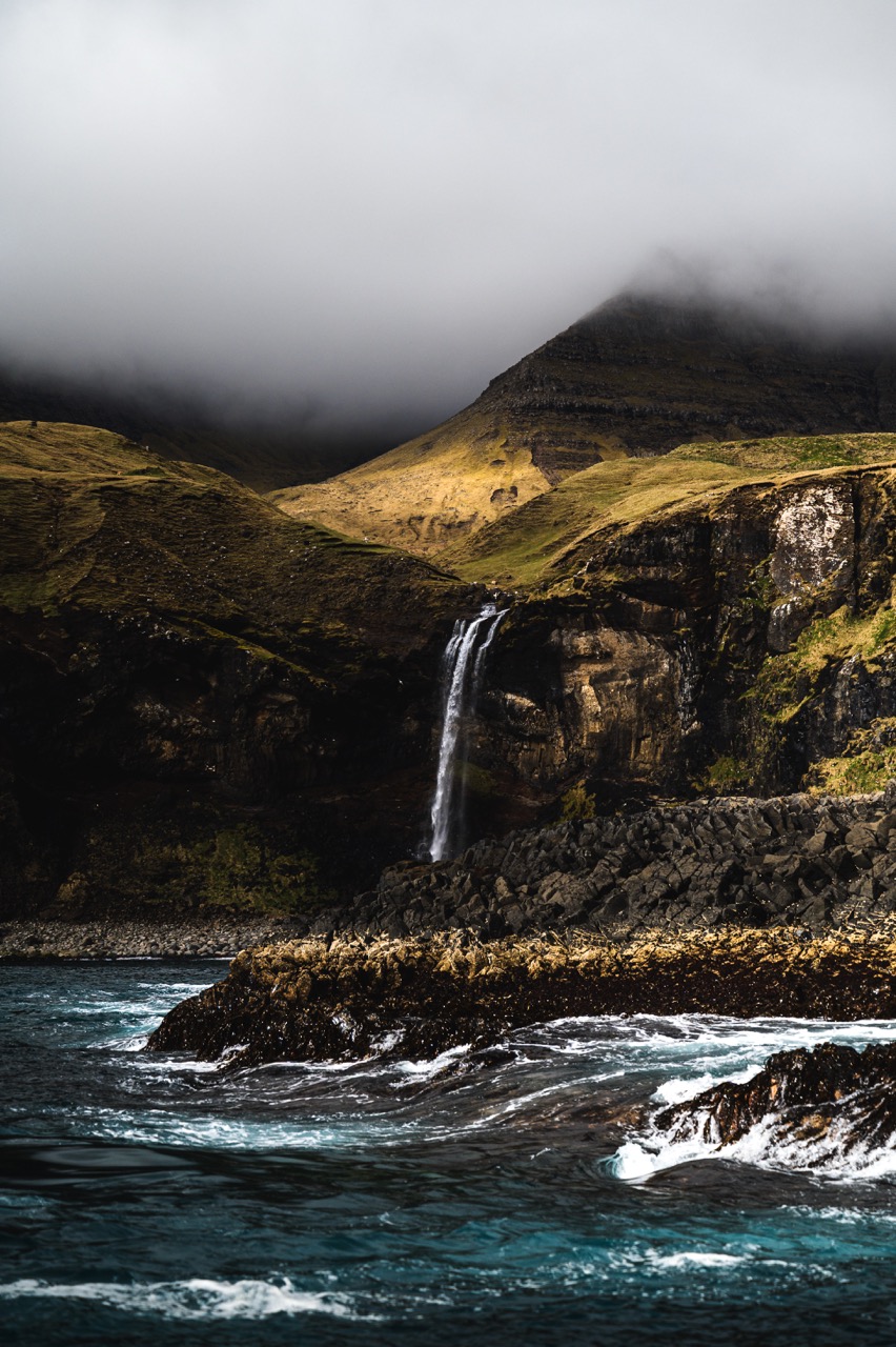 A photo of a waterfall in the Faroe Islands